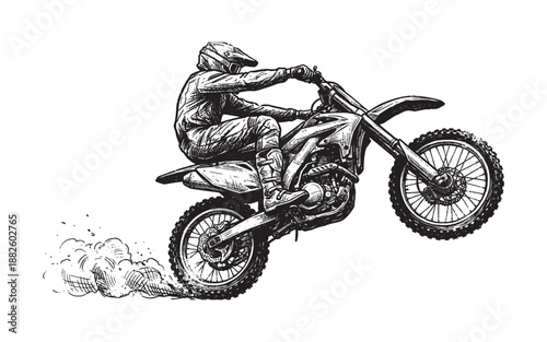Motocross Rider Performing a Wheelie with Dust Trail