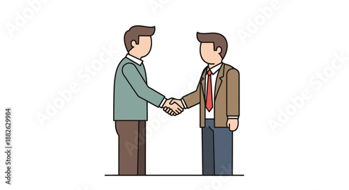 Two professionals dressed in office attire shake hands signifying agreement and partnership success in business discussions