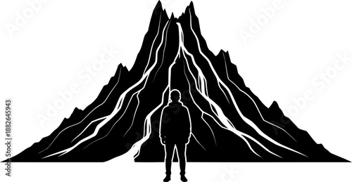 Person standing in front of a majestic mountain silhouette with abstract rock formations.
