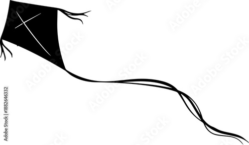 Silhouette of a Black Kite Flying in a Clear Blue and Golden Sunset Sky