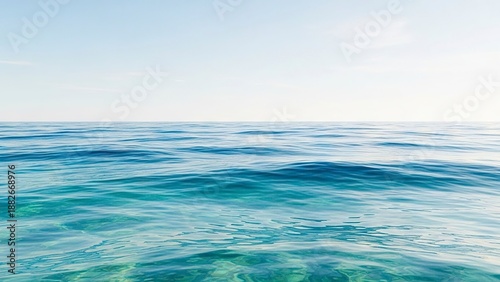 Ocean water under a clear sky showing waves and the seabed