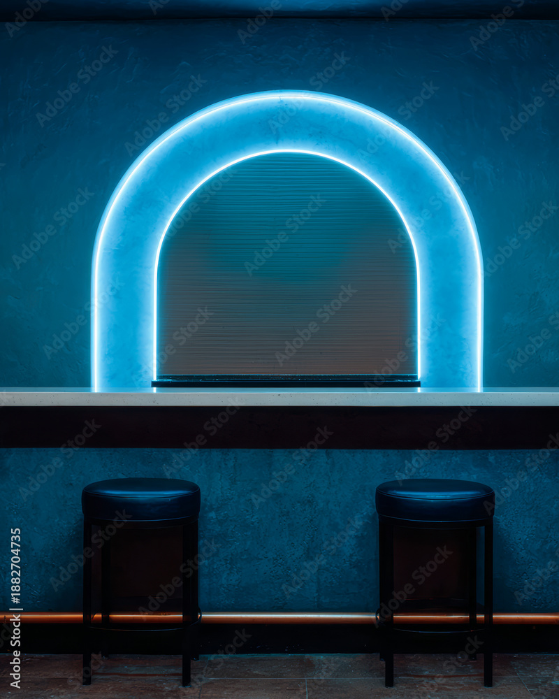 Fototapeta premium Neon archway accentuates modern bar scene with sleek stools in an urban setting during evening hours