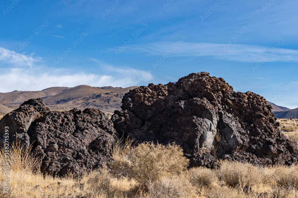 Obraz premium Trail to Little Lake Overlook, Coso Volcanic Field, Inyo County, California. Coso Range, Basin and Range Province. Volcanic rock, Basalt flows.