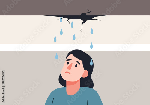 Woman distressed by water dripping from a cracked ceiling.