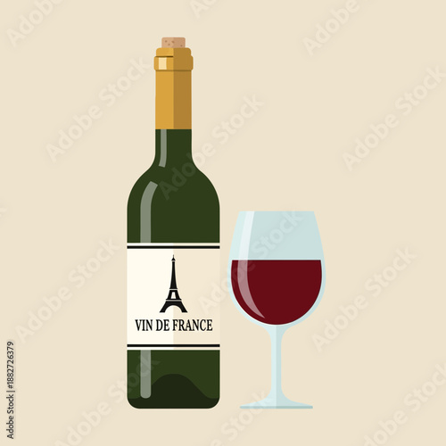 Green wine bottle and glass of red wine with Eiffel Tower label.