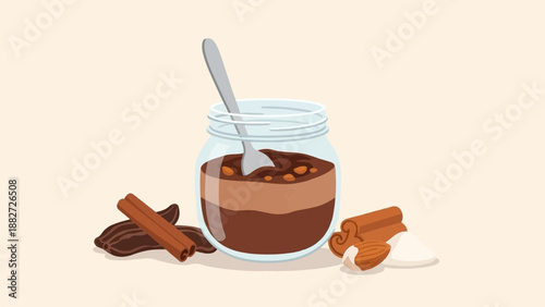 A jar of chocolate spread with almonds, cinnamon, and cocoa beans