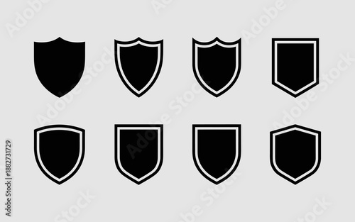 Collection of shield icons with black fill and white outline representing security protection defense and guard services vector illustration for antivirus software company cybersecurity business and m