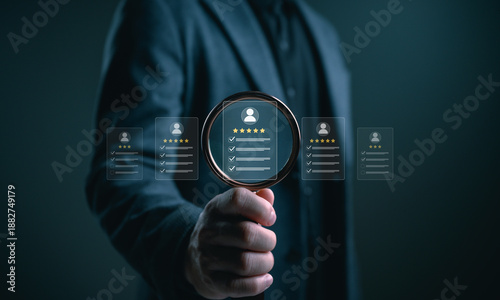 Billede på lærred Businessman holding magnifying glass selecting top rated profile with five star review, representing talent recruitment, candidate evaluation, customer rating analysis, trust, quality selection