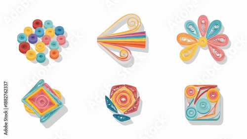 Colorful paper quilling creations arranged on a white background