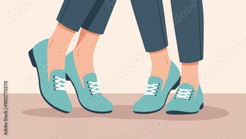 Close-up of two pairs of feet wearing teal loafers with white laces and dark pants