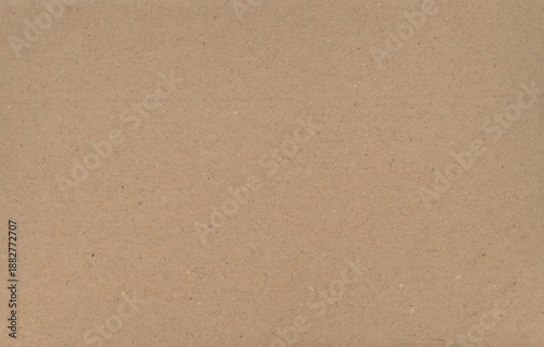 Blank vintage brown cardboard texture background with an old recycled kraft paper pattern on a rough aged surface