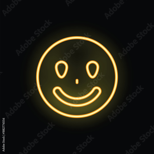 Bright yellow neon sign is glowing on a black background, in the shape of a classic smiley face with heart shaped eyes, showing happiness