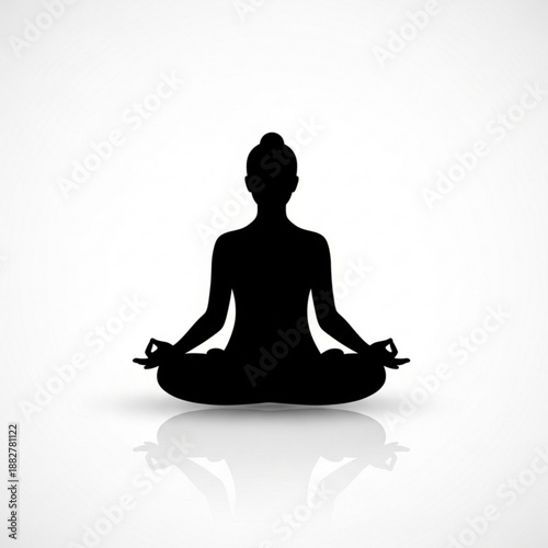 Serene silhouette of a person meditating in lotus position on a calm surface viewed from behind
