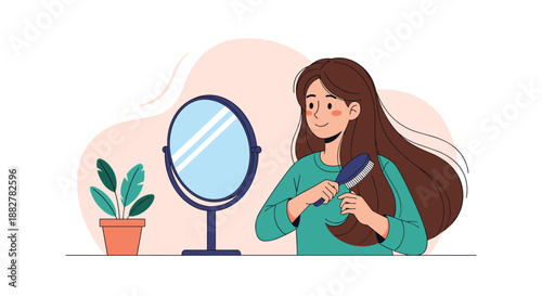 Smiling young woman sitting at her vanity table and brushing her long brown hair while looking into a round mirror.