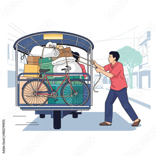 Man pulling overloaded tuk-tuk with bicycle and goods on street