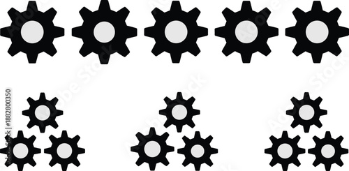 Black gear wheels in creative pattern arrangement representing mechanical processes engineering and manufacturing industry innovation and teamwork collaboration concept for presentations websites and