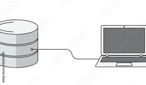 Laptop connects to external hard drive with cable for data transfer and storage expansion