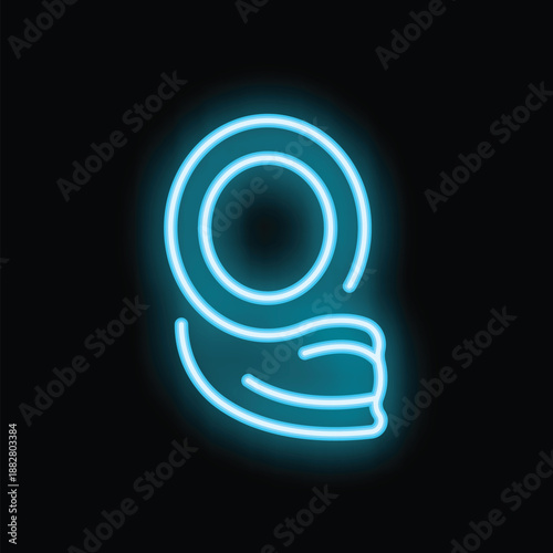 Obraz na plátně Bright blue neon sign depicting a traditional muslim hijab headscarf glowing on