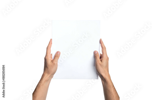 A person is holding a glass of milk and a blank paper sheet showing an empty message board for a business advertisement concept