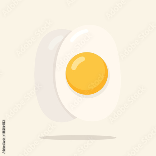 Freshly Sliced Egg Showing Yolk, Minimalist Style, Perfect for Culinary and Food Concepts