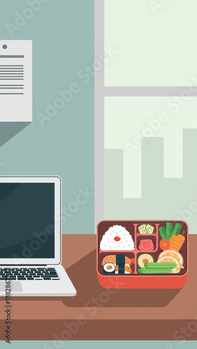 Healthy And Fresh Bento Lunchbox Beside a Modern Laptop, Work from Home Vibe