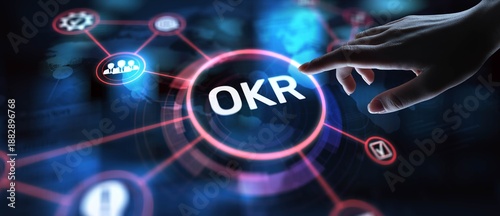 OKR Objectives and Key Results for Performance Management, projection on a virtual screen, Business and Technology Concept. © WrightStudio