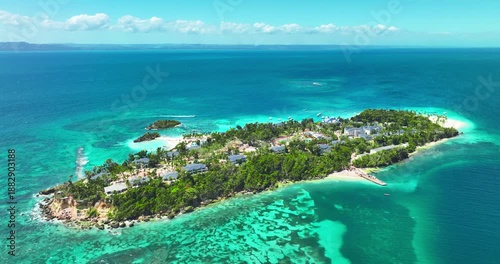 Exotic tropical island with palm trees and white sands in the ocean Exotic summer Getaway Dominican Republic aerial travel landscape