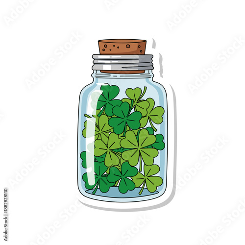 Glass Jar Filled with Lucky Green Clovers and Shamrocks for St Patricks Day Celebration.