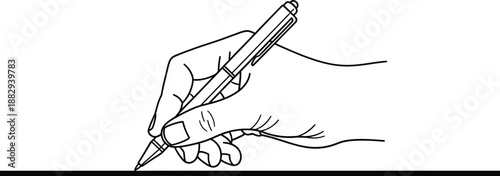 A hand holding a pen writing on a line