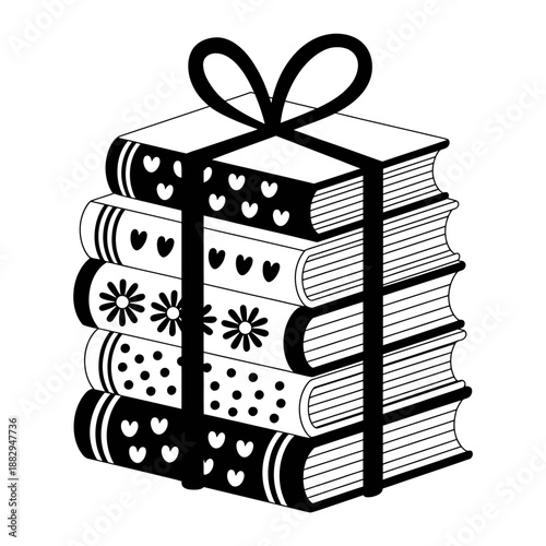 Stack of books with decorative spines tied with a bow