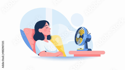 Person relaxing, enjoying cool air from a fan on a hot day