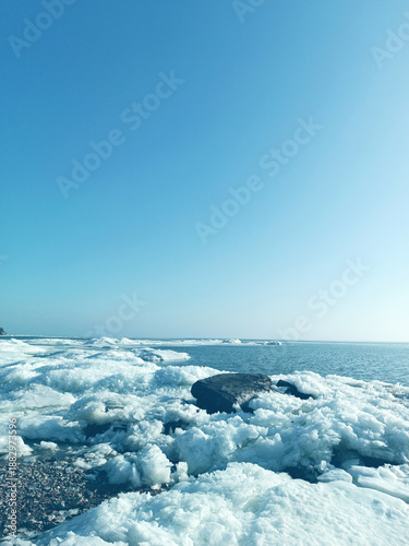 Frozen ice on a sea background