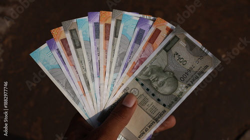 Cuadro en lienzo Close-up of Indian Rupee Notes - Currency of India Held in Hand, money concept