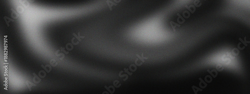 Monochrome grainy texture with soft blur effect and gentle light creates versatile wallpaper ideal for futuristic art, vintage covers, and elegant wide banners.