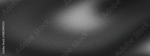 Black gradient background with grainy texture and smooth white glow creates an elegant abstract design perfect for modern posters, banners, and creative headers.