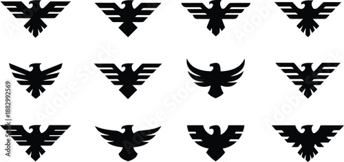 A varied selection of black eagle and phoenix symbols presented neatly against a bright white background