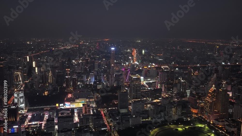 Wallpaper Mural Tripod aerial view of Bangkok cityscape at night. Downtown area with illuminated skyscrapers, buildings, and urban traffic lights Torontodigital.ca