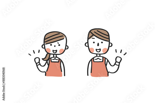 ガッツポーズをするエプロン姿の男女