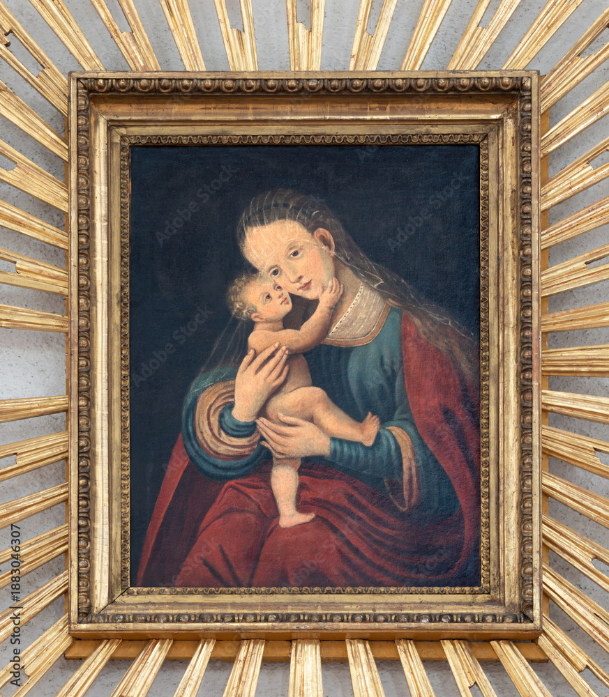 Fototapeta premium SALZBURG, AUSTIRA - SEPTEMBER 7, 2025: The painting of Madonna in the church Andrea kirche by unknown artist
