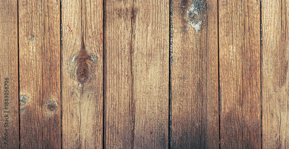 Obraz premium Brown wooden background with vertical planks, natural wood grain and texture. Rustic wooden wall surface for design, banner or backdrop, warm natural pattern, clean horizontal composition.