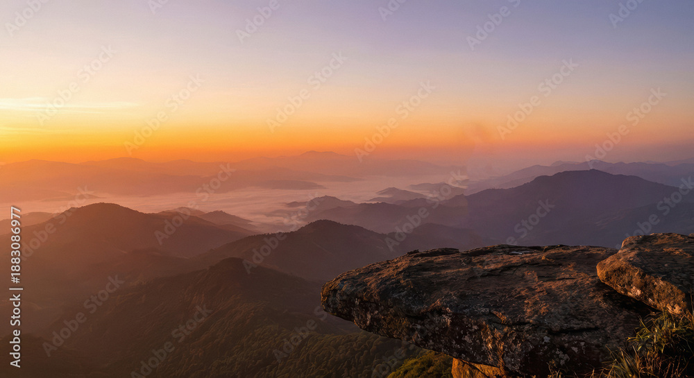 Fototapeta premium dawn over layered mountain ranges