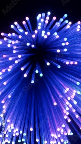 Fiber Optic Cables Transmitting Data and Light Signals in a Dark Environment.