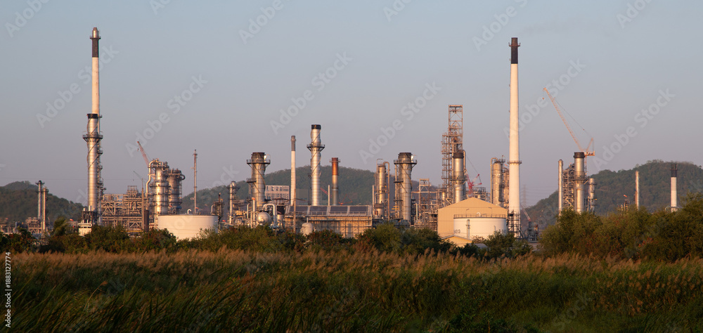 Fototapeta premium Oil and Gas Industrial zone,The equipment of oil refining,Close-up of industrial pipelines of an oil-refinery plant,Detail of oil pipeline with valves in large oil refinery.