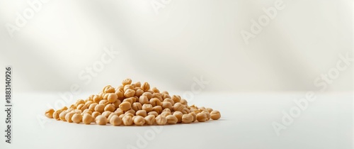 Uncooked chickpeas on a chickpea background illustrating healthy vegetarian food concept with high-resolution full depth of field image
