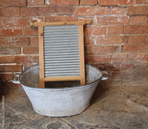 A Traditional Laundry Scrubbing Board in a Metal Tin Bath.