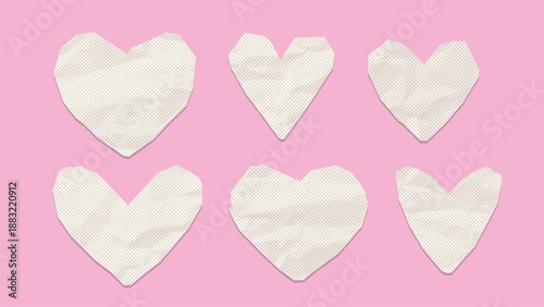 Set of different shaped white cutout hearts of crumpled paper. Cut hearts in pop art style with torn edge. Vintage realistic elements with wrinkled paper texture for Valentines Day collage. Vector