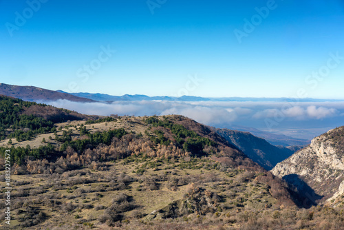 Abruzzo Apennine mountain landscape with valley clouds in Italy