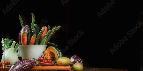 mixed vegetables on a table with black background