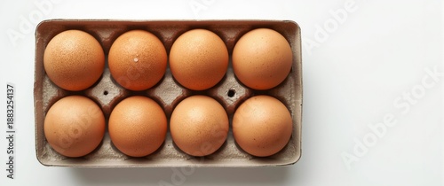 Brown chicken eggs arranged...