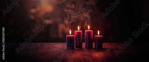 Table with five burning can...